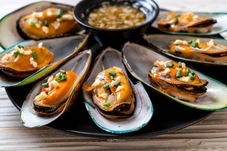 seafood mussels with lemon and garlicの写真素材