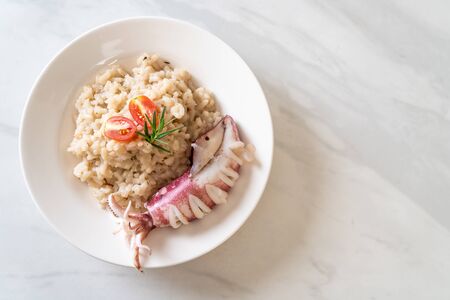 homemade squids or octopus risottoの写真素材