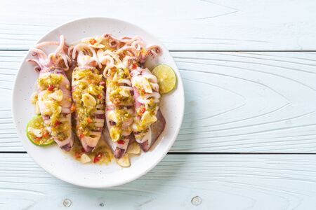 Steamed Squids or Octopus with Spicy Chili and Lemon Lime Sauceの写真素材