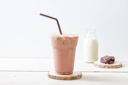 Iced chocolate milkshake drink on wood backgroundの写真素材