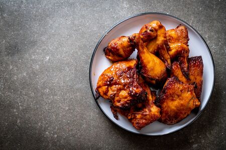 grilled and barbecue chicken on tableの写真素材