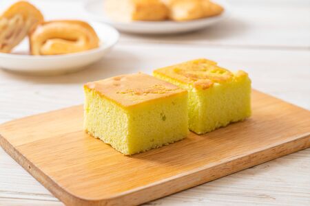 Homemade pandan cake on wood backgroundの写真素材