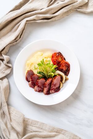 grilled duck breast with sauce, mash potatoes and vegetableの写真素材