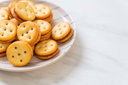 coconut biscuit with pineapple jamの写真素材