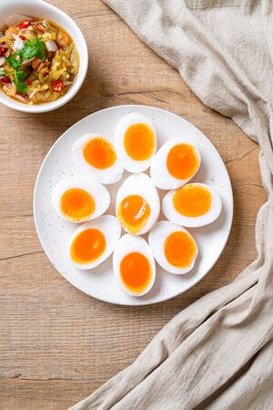 Soft Boiled Eggs Spicy Salad - Healthy food styleの写真素材