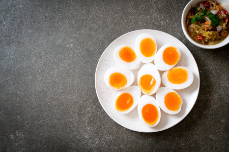 Soft Boiled Eggs Spicy Salad - Healthy food styleの写真素材