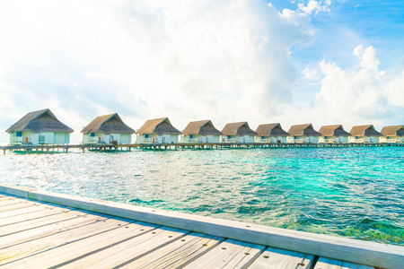 tropical Maldives resort hotel and island with beach and sea for holiday vacation concept - boost up color processing styleのeditorial素材