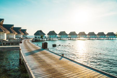 Beautiful tropical Maldives resort hotel and island with beach and sea  - boost up color processing styleのeditorial素材