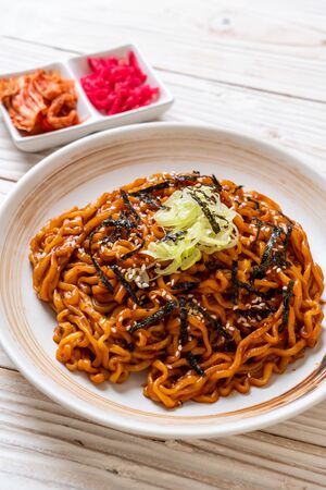 Korean hot and spicy instant noodle with kimchi - korean food styleの写真素材