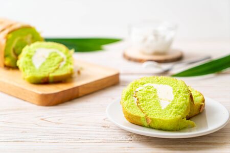 Pandan roll cake with vanilla creamの写真素材