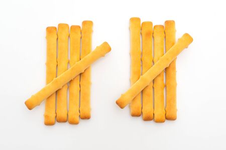 Biscuits bread stick isolated on whiteの写真素材