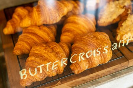 butter croissant on shelf in cafe restaurant