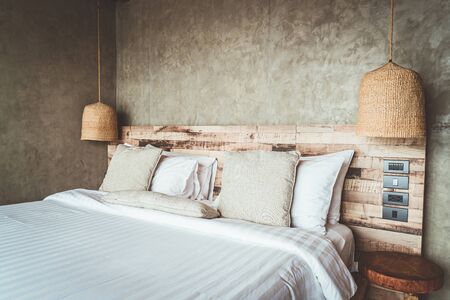 beautiful comfortable pillows decoration on bed in bedroomの写真素材