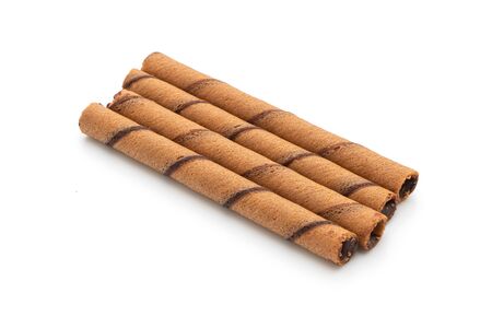 chocolate wafer stick roll isolated on white backgroundの写真素材