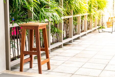 empty wood chair with tree backgroundの写真素材
