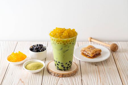 matcha green tea latte with bubble and honey bubblesの写真素材