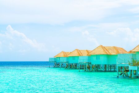 Beautiful tropical Maldives resort hotel and island with beach and sea - holiday vacation background concepの写真素材