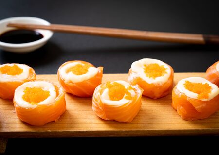 fresh salmon sushi roll with mayonnaise and shrimp egg - Japanese food styleの写真素材
