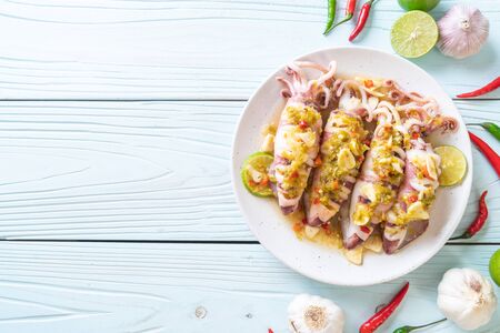 Steamed Squids or Octopus with Spicy Chili and Lemon Lime Sauce