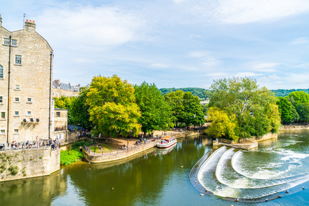 BATH, ENGLAND - AUG 30, 2019:View of the Pulteney Bridge River Avon in Bath, England, United Kingdom.のeditorial素材