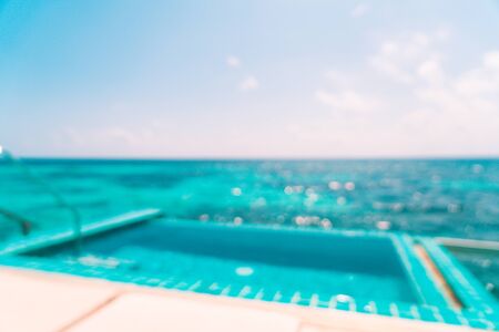 abstract blur and defocused swimming pool and sea background in Maldivesの写真素材