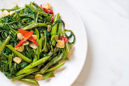 Stir-Fried Chinese Morning Glory or Water Spinach - Asian food styleの写真素材
