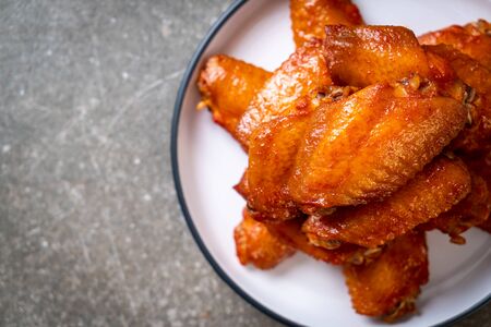 barbecue chicken wings with sauceの写真素材
