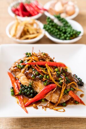 stir-fried spicy and herb with grouper fish fillet  - Thai food styleの写真素材
