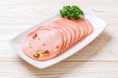 Pork bologna with chilli on plateの写真素材