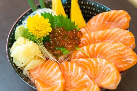 fresh salmon on topped rice bowl (donburi) - Japanese food styleの写真素材