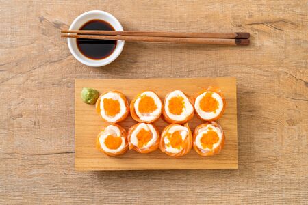 fresh salmon sushi roll with mayonnaise and shrimp egg - Japanese food styleの写真素材
