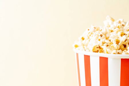 Movie Popcorn in bucket on wood backgroundの写真素材
