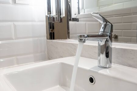 close-up tap or faucet in bathroomの写真素材