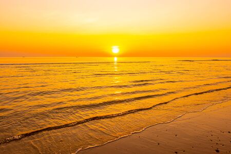 beautiful sunrise or sunset with twilight sky and sea beachの写真素材