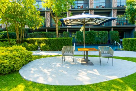 empty outdoor patio chair decoration in gardenの写真素材