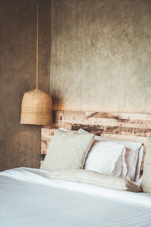 beautiful comfortable pillows decoration on bed in bedroomの写真素材