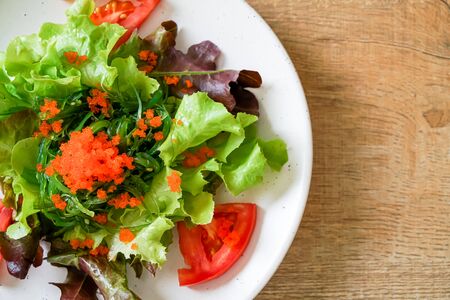 vegetable salad with Japanese seaweed and shrimp eggs - healthy and vegetarian food styleの写真素材
