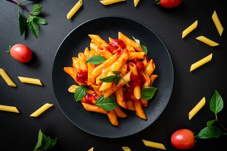 Penne pasta in tomato sauce - Italian food style