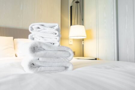 white towel shower on bed decoration in hotelの写真素材