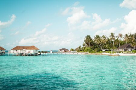 tropical Maldives resort hotel and island with beach and sea for holiday vacation concept - boost up color processing styleのeditorial素材