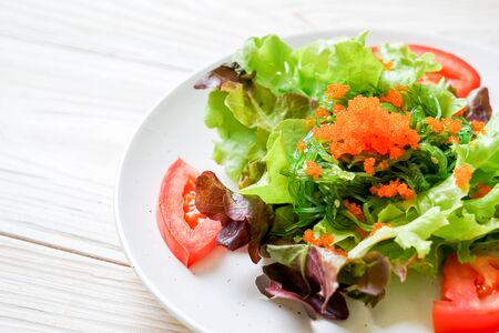 vegetable salad with Japanese seaweed and shrimp eggs - healthy and vegetarian food styleの写真素材