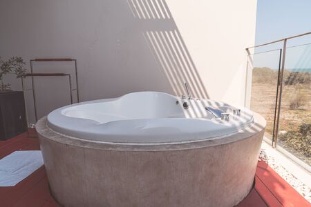 Bathtub decoration on balconyの写真素材