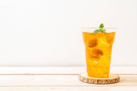 Chinese plum juice with ice and mintの写真素材