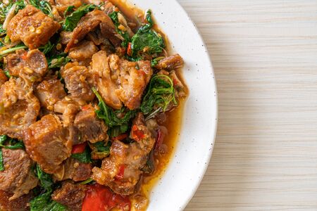 stir-fried crispy pork belly and basil - Asian local street food styleの写真素材