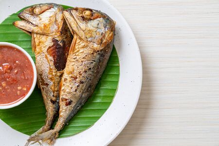 Fried mackerel fish with spicy shrimp paste sauce - Thai food styleの写真素材