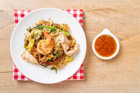 Dried sukiyaki - stir-fried vermicelli with vegetables and seafood  in sukiyaki sauceの写真素材