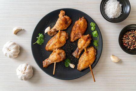 grilled chicken wings barbecue with pepper and garlicの写真素材
