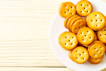 biscuits with pineapple jam on wood backgroundの写真素材