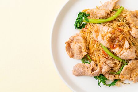 Stir-fried rice vermicelli and water mimosa with pork - Asian food styleの写真素材