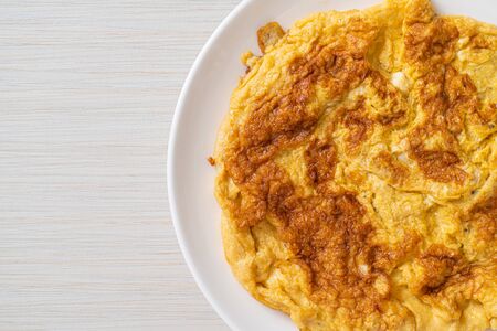 Omelet or Omelette with Ketchup